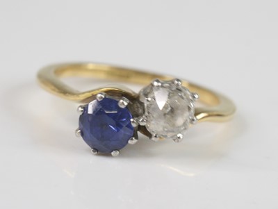 Lot 2208 - A yellow and white metal, sapphire and diamond...