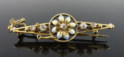 Lot 2158 - A yellow metal diamond floral bar brooch, with...