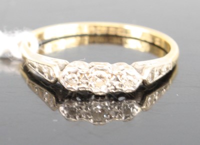 Lot 407 - An 18ct yellow and white gold diamond...