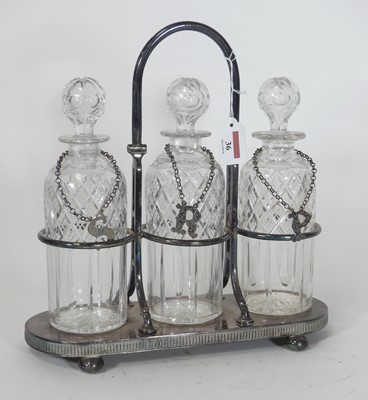 Lot 36 - A Victorian silver plated decanter stand,...