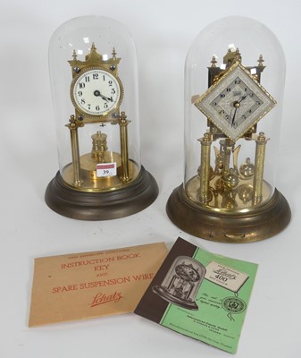 Lot 39 - A German brass anniversary clock, having an...
