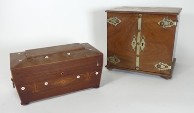 Lot 50 - A regency mahogany tea caddy of a sarcophagus...