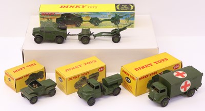 Lot 674 - Dinky Toys group of 4 playworn military...