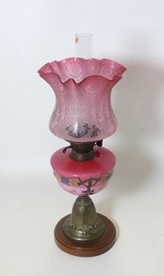 Lot 87 - An Edwardian oil lamp, having an acid etched...
