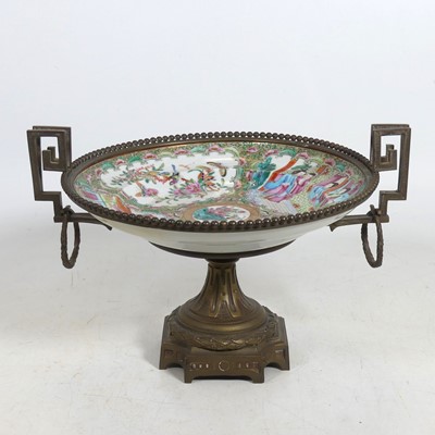 Lot 111 - A porcelain and gilt metal tazza, the Chinese...