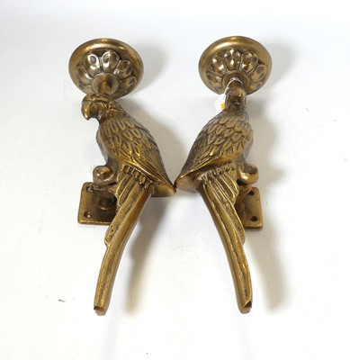 Lot 114 - A pair of reproduction cast metal parrot wall...