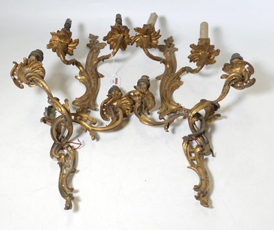 Lot 119 - A pair of 19th century gilt metal twin branch...