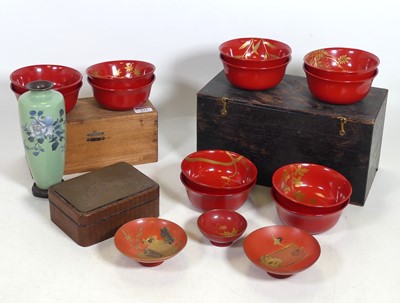Lot 121 - A collection of Chinese red lacquered bowls,...