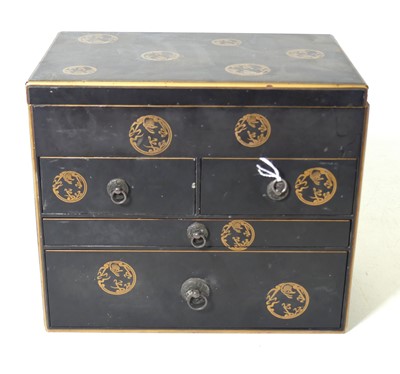 Lot 139 - A Japanese black lacquered and gilt decorated...