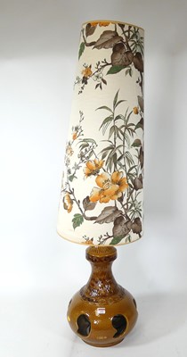 Lot 153 - A brown glazed West German pottery lamp,...