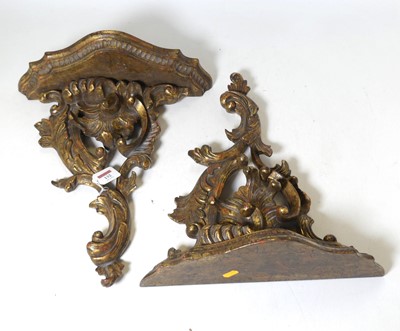 Lot 132 - A pair of carved wooden wall sconces in the...