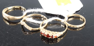 Lot 405 - A 9ct gold garnet half-hoop ring, size P, a...