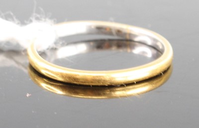 Lot 412 - A platinum and yellow metal mounted wedding...