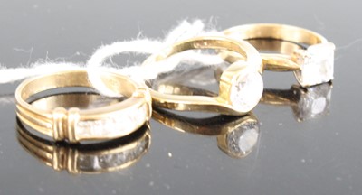 Lot 415 - Three various 9ct gold and CZ set dress rings...