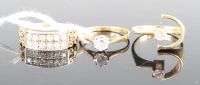 Lot 416 - Three various 9ct gold and CZ set dress rings,...