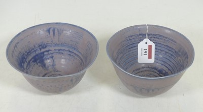 Lot 191 - A pair of studio pottery footed bowls, each...