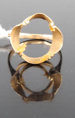 Lot 424 - A modern 9ct gold ring (lacking stone), size N,...