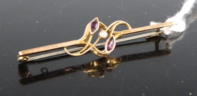 Lot 430 - A 9ct gold, amethyst and seed pearl set bar...