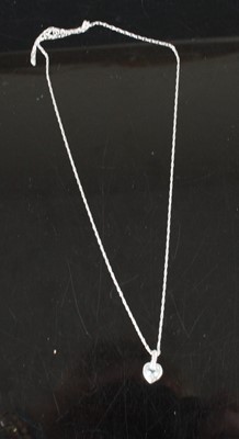 Lot 433 - A modern 9ct white gold and moissanite set...
