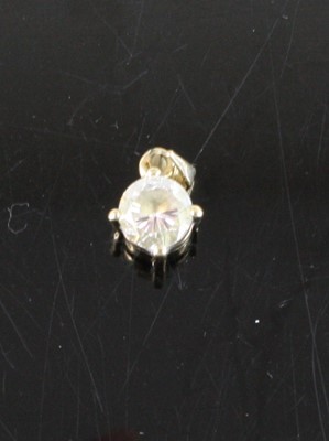Lot 434 - A 9ct gold white paste set pendant, stone...