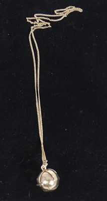 Lot 443 - A silver-gilt Masonic ball pendant, folding...