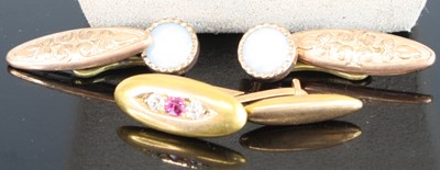 Lot 449 - A single yellow metal, ruby and diamond set...