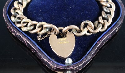 Lot 454 - A 9ct gold hollow and engraved curblink...