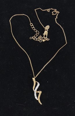 Lot 456 - A gilt metal paste set pendant on neck chain