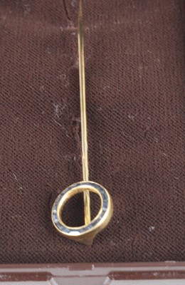 Lot 461 - A yellow metal and sapphire set circular...