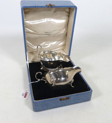 Lot 229 - A pair of George VI silver sauceboats of...