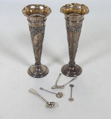 Lot 230 - A pair of Edwardian silver spill vases, each...