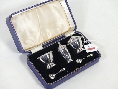 Lot 231 - A George VI silver three-piece cruet set, each...