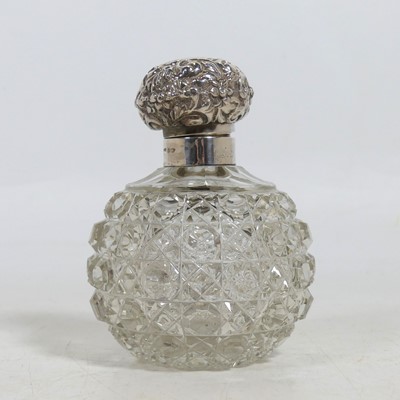 Lot 233 - An early 20th century silver mounted scent...