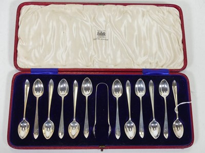 Lot 240 - A set of twelve George V silver coffee spoons,...