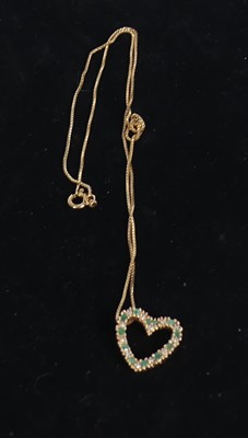Lot 465 - A silver-gilt emerald and diamond point set...