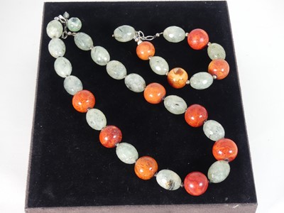 Lot 489 - A beaded chrysoprase necklace, 50cm, together...