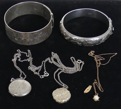 Lot 491 - A sterling silver leaf and flower engraved...