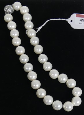 Lot 493 - A beaded faux pearl necklace with paste set...
