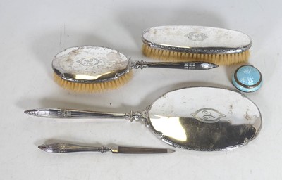 Lot 247 - A white metal clad four-piece dressing table...