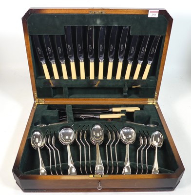 Lot 258 - An early 20th century walnut cased canteen of...
