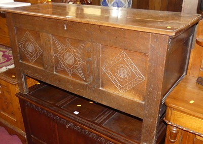 Lot 1188 - An 18th century joined oak three-panelled...