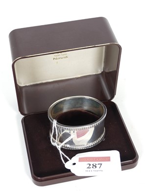 Lot 287 - An Elizabeth II silver napkin ring, of plain...