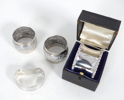 Lot 302 - A George V silver napkin ring of waisted...