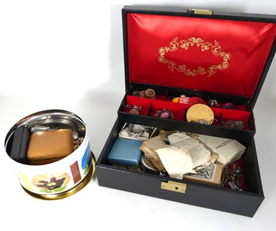 Lot 336 - A leather-clad jewellery box and contents, to...