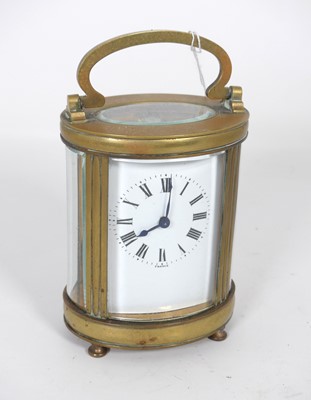 Lot 340 - A 20th century lacquered brass cased carriage...