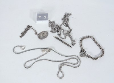 Lot 375 - A white metal curb link bracelet with sterling...