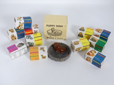 Lot 383 - A small collection of boxed Wade Whimsies, to...