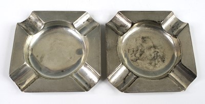 Lot 108 - A pair of Art Deco silver ashtrays, each of...