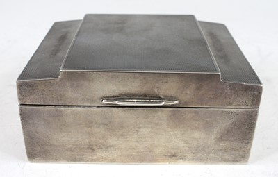 Lot 114 - An Art Deco silver table cigarette box, having...