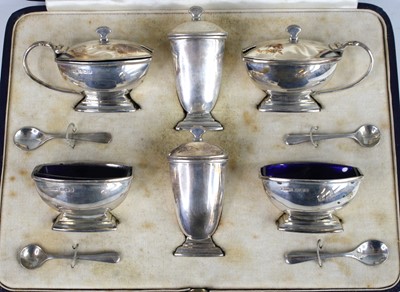 Lot 119 - An Art Deco silver twin condiment set by...